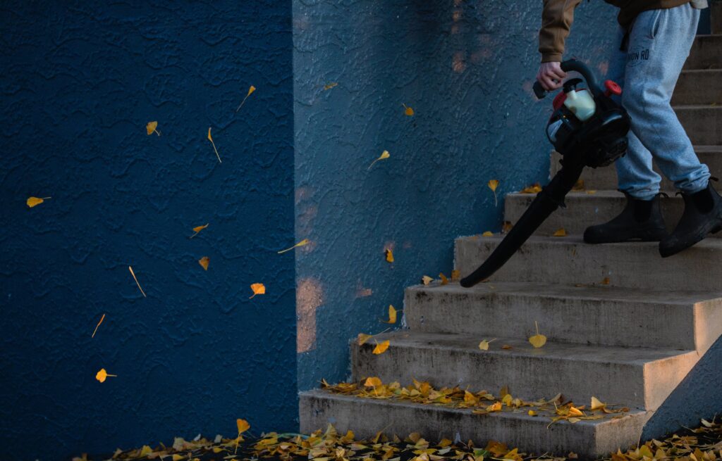 Destructive invention - person leaf blowing steps